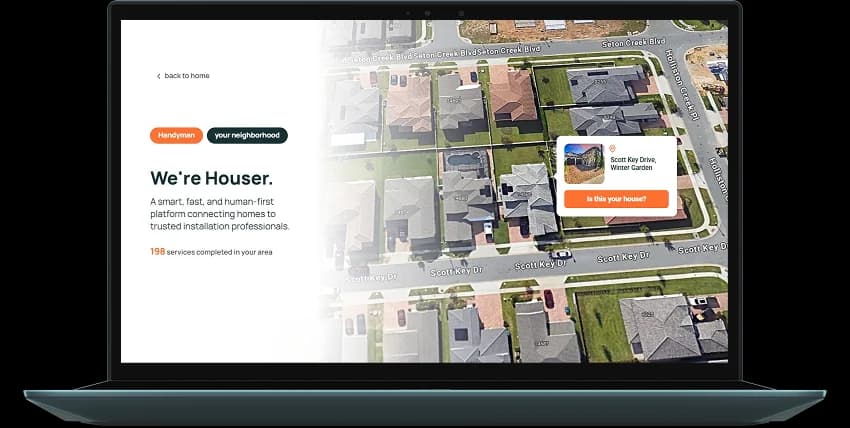 Laptop showing the Houser platform over a satellite image of a residential neighborhood